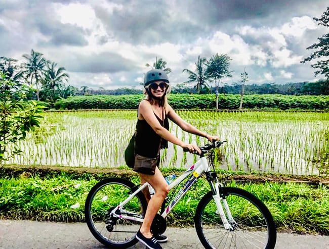 Bliss Bali retreat for women eat pray love girl on bike