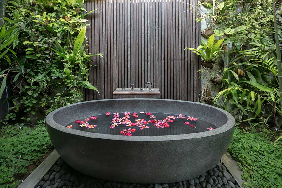 gorgeous luxury stone bath outdoor bathroom Ubud Bali resorts