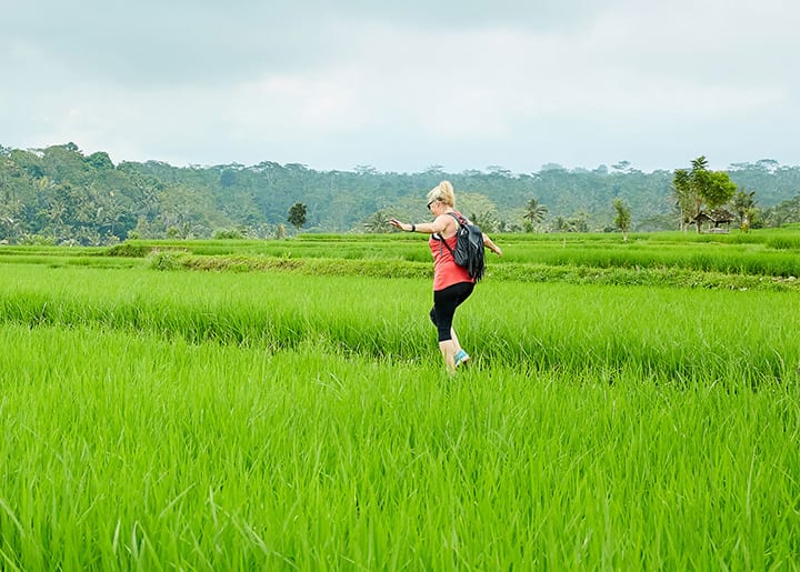 Bliss Bali retreat guest running enjoying nature