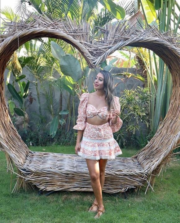 Guest in beautiful garden at Bliss Bali retreat